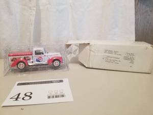 lot 48 image: 1940 Ford Delivery Truck Die-cast Metal Replica Model (in original packaging)