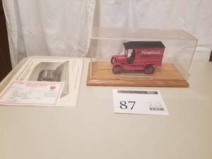 lot 87 image: 124 Scale 1925 Ford Model T Panel Delivery Truck Die-cast Metal Replica Model by Danbury Mint