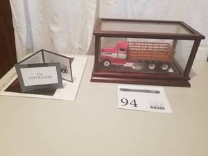 lot 94 image: 132 Scale 1939 Peterbilt Stakebed Semi Tractor Die-cast Metal Replica Model by Franklin Mint