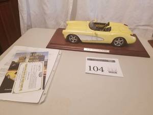 lot 104 image: Museum Masterpiece 112 Scale 1957 Chevrolet Corvette Street Machine Roadster Die-cast Metal Replica Model by Danbury Mint