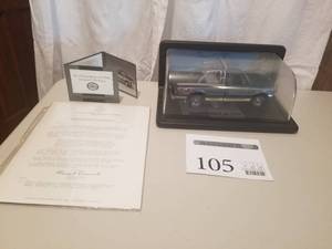 lot 105 image: Field & Stream 124 Scale 1996 Ford F-150 Pickup Truck Die-cast Metal Replica Model by Franklin Mint