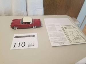 lot 110 image: 124 Scale 1953 Studebaker Commander Starliner Coupe Die-cast Metal Replica Model by Danbury Mint