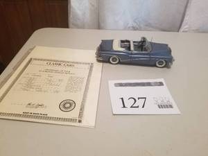 lot 127 image: 124 Scale 1953 Buick Skylark Convertible Die-cast Metal Replica Model by Danbury Mint