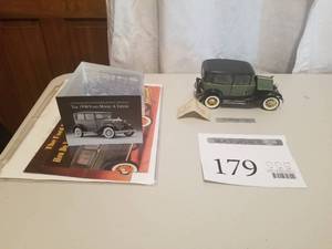 lot 179 image: 124 Scale 1930 Ford Model A Tudor Coupe Die-cast Metal Replica Model by Franklin Mint