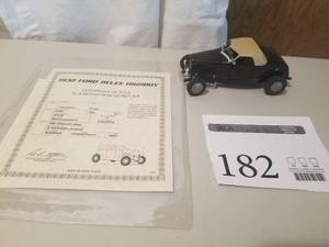 lot 182 image: 124 Scale 1932 Ford Duece Highboy Roadster Die-cast Metal Replica Model by Danbury Mint