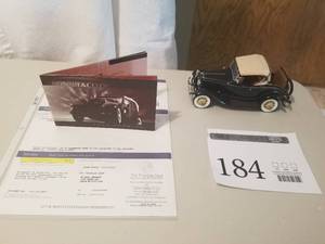 lot 184 image: 124 Scale 1932 Ford V-8 Sedan Convertible Die-cast Metal Replica Model by Franklin Mint