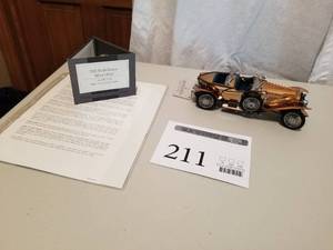 lot 211 image: 124 Scale 1921 Rolls-Royce Silver Ghost Roadster Die-cast Metal with Solid Copper Body Replica Model by Franklin Mint