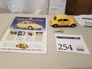 lot 254 image: 124 Scale 1967 Volkswagon Beetle Coupe Die-cast Metal Replica Model by Franklin Mint