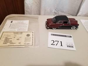 lot 271 image: 124 Scale 1950 Ford Crestliner Sedan Die-cast Metal Replica Model by Danbury Mint