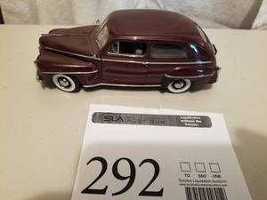 lot 292 image: 124 Scale 1947 Ford Super Deluxe Wagin Die-cast Metal Replica Model by Danbury Mint