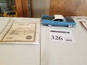 lot 326 image: 124 Scale 1959 Cadillac De Ville Coupe Die-cast Metal Replica Model by Danbury Mint