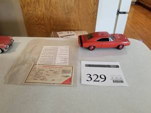 lot 329 image: 124 Scale 1969 Dodge Charger 500 Coupe Die-cast Metal Replica Model by Danbury Mint