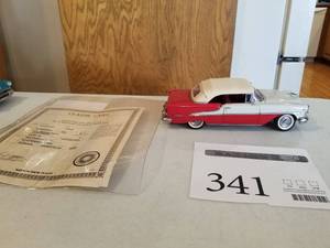 lot 341 image: 124 Scale 1955 Oldsmobile Super 88 Convertible Die-cast Metal Replica Model by Danbury Mint