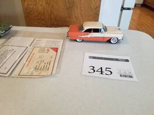 lot 345 image: 124 Scale 1955 Oldsmobile Super 88 Coupe Die-cast Metal Replica Model by Danbury Mint