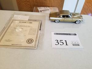 lot 351 image: 124 Scale 1957 Studebaker Golden Hawk Sedan Die-cast Metal Replica Model by Danbury Mint