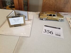 lot 356 image: 124 Scale 1948 Tucker 50th Anniversary Sedan Die-cast Metal Replica Model by Franklin Mint