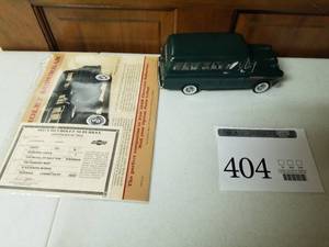 lot 404 image: 124 Scale 1957 Chevrolet 3100 Model DP Half-Ton Suburban Die-cast Metal Replica Model by Danbury Mint