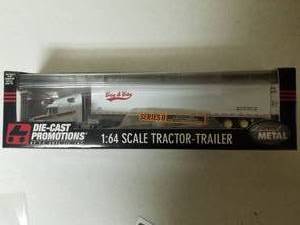 lot 416 image: 164 Scale Tractor-Trailer Die-cast Metal Replica Model by Ertl (in original packaging)