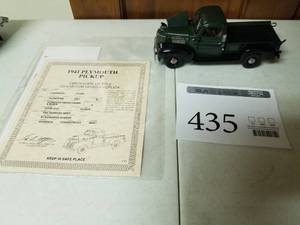lot 435 image: 124 Scale 1941 Plymouth PT125 4112 Pickup Truck Die-cast Metal Replica Model by Danbury Mint