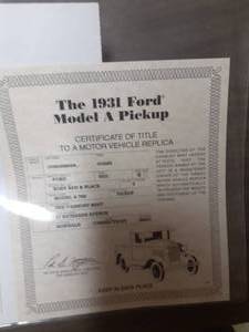 lot 466 image: 124 Scale 1931 Ford Model A 76B Pickup Truck Die-cast Metal Replica Model by Danbury Mint
