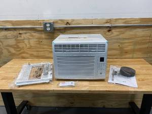 lot 12 image: GE 6,000 BTU 115-Volt Window Air Conditioner for 250 sq. ft. Rooms in White with Remote