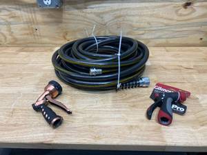 lot 115 image: Water Hose and Two Spray Attachments
