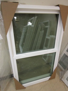 lot 121 image: LINDSAY DOUBLE-HUNG POCKET WINDOW - NEW (W DAMAGE), 33 x 55