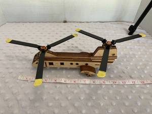 lot 11 image: Wooden CH-46 Military Helicopter - Assembled by Local Veteran through Help Heal Veterans