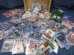 FOOTBALL  BASEBALL CARDS IN PROTECTIVE SLEEVES