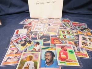 OVER 30 VINTAGE FOOTBALL CARDS IN PLASTIC