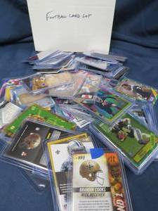 OVER 100 FOOTBALL CARDS IN PLASTIC SLEEVES