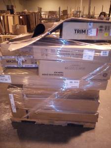 Pallet of new and like new trim kits and locker bases