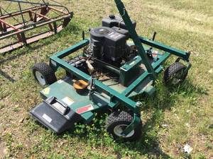 lot 26 image: Swisher 60 Pull Behind Mower