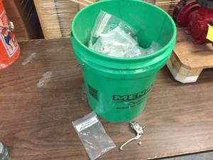 lot 57 image: 60pc Tital Power Tool Lever Assemblies