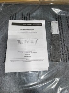 lot 82 image: HAMPTON BAY Tolston 3-Piece Wicker Outdoor Patio Sectional Set with Charcoal Cushions. See Pictures