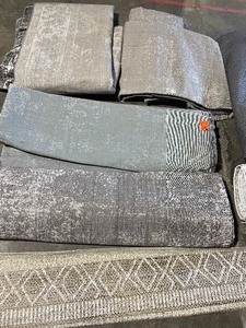 lot 83 image: Assorted Out of Packaging Area Rugs. Various Designs & Sizes. See Pictures