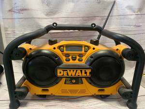 lot 12 image: DeWalt DC011 Work Site Radio  Charger (used sold $135 on Ebay)