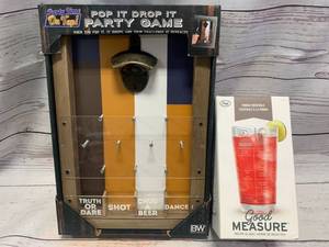 lot 16 image: New Pop It Party Game & Vodka Recipe Glass