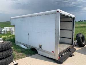 lot 79 image: Uhaul Van Body (apporx 8 wide 15 long with 28 overhang)
