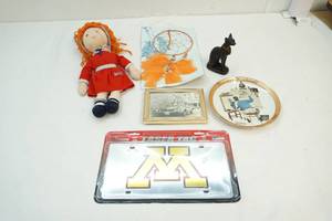 Annie doll, sphinx figure, Norman Rockwell plate, car photo, dream catcher
