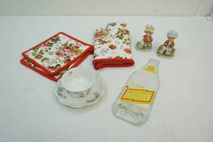 Teacup, melted bottle, oven mit, figures