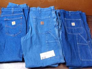lot 34 image: 9 Pairs of Carhartt Jeans- 1 33x32 Carpenter Jeans, 4 34x30 Carpenter Jeans, 1 34x32 Carpenter Jeans, 2 34x28 Relaxed Fit Jeans, 1 34x30 Relaxed Fit Jeans,