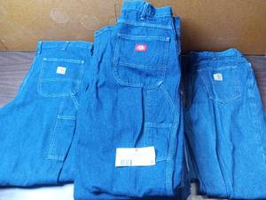 lot 35 image: 10 Pairs of Carhartt and Dickies Jeans- 1 33x34 Carhartt Relaxed Fit  2 34x34 Carhartt Carpenter Jeans  7 34x34 Dickies Carpenter