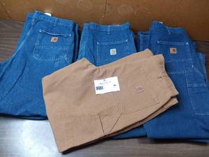 lot 40 image: 11 Pairs Of Cahartt Jeans - 10 Denim 36x32 Dungaree Fit, 1 Khaki 36x32 Dungaree Fit