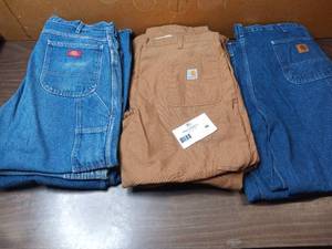 lot 50 image: 10 Pairs of Carhartt and Dickies Jeans - 3 40x30 Dickies Carpenters Jeans, 4 Khaki 42x30 Carhartt Carpenters Jeans, 3 40x30 Carhartt Carpenters Jeans