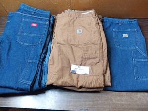 lot 56 image: 10 42x32 Dickies & Carhartt Jeans - 2 Dickies BRAND NEW TAGS STILL ON Carpenters Jeans, 1 Denim Carhartt Carpenters Jeans, 4 Khaki Carhartt Carpenters Pants, 2 Dickies Carpenters Jeans