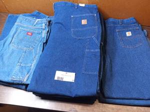 lot 57 image: 10 Pairs of Carhartt & Dickies Jeans - 4 42x36 & 1 48x32 Carhartt Carpenters Jeans BRAND NEW TAG STILL ON, 12 40UL Dickies Carpenters Jeans, 1 42x34 Dickies Carpenters Jeans, 1 42x34 Carhartt Relaxed Fit Jeans, 1 42x34 Carhartt Carpenters Jeans