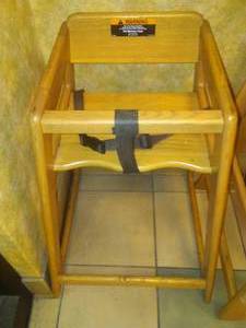 lot 94 image: Wood Booster Chair.