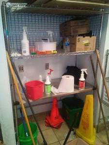 lot 140 image: Locking Storage with Drop Down Door and Stainless Shelf.