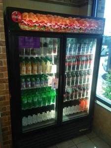 lot 144 image: Bottle Beverage Cooler, lighted. 54 in. W x 78T x 32 D